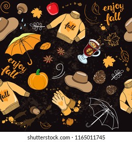 Autumn doodle items and inscription enjoy fall on a black background seamless pattern