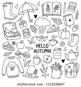 Autumn doodles. Hand drawn set of sketches: rubber boots,cloud, book, cup of tea, sweater, umbrella, pie, apple, mushrooms, leaves, flowers etc. Isolated objects on white background