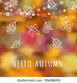 Autumn, fall background with hand drawn leaves and blurred background, vector illustration