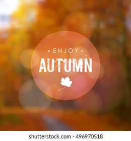Autumn fall blurred background with maple leaf and forest. Modern design for cards, invitations, leaflets, brochures, covers. Vector illustration.