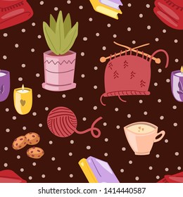 Autumn. Fall. Cute vector seamless pattern. Сup of coffee, flower in a pot, yarn, luck, books, candles, cookies