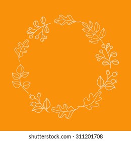 Autumn fall wreath of leaves branches and berries simple outline drawing illustration with fresh vivid light orange background