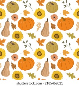 Autumn festival seamless pattern with orange, and brown pumpkins, dry forest leaves, and sunflowers. Isolated on white background. Autumn harvest illustration. Thanksgiving wallpaper.