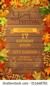 Autumn Festival template. Bright colorful autumn leaves on vertical wood background. You can place your text in the center.