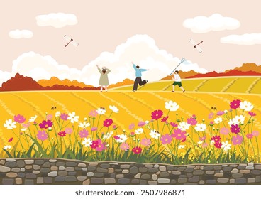 Autumn field landscape with cosmos flowers blooming on the fence
