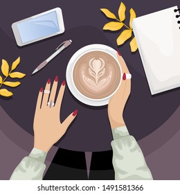 Autumn flat lay with the girl sitting at a table in a cafe with a Cup of cappuccino. Notebook, pen, smartphone, autumn leaves.
