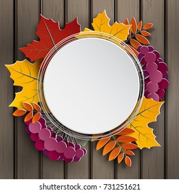 Autumn floral paper cut frame and paper colorful tree leaves on wooden background. Autumnal design for fall season sale banner, poster, flyer, web site, paper craft style, vector illustration