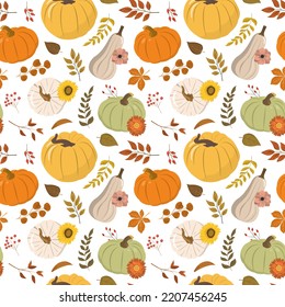 Autumn floral seamless background with orange, beige, yellow pumpkins, forest leaves, and red berries. Isolated on white background. Autumn harvest illustration. Thanksgiving wallpaper.