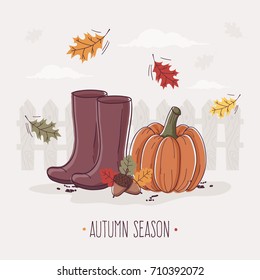 Autumn Garden with Pumpkin, Rubber Boots and Leaves. 