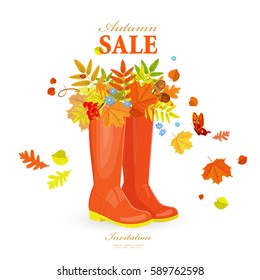 Autumn greeting card with colorful fall leaves in rubber boots