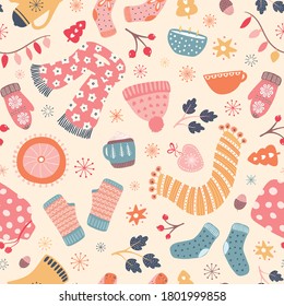 Autumn Hygge pattern design . Vector winter and Fall seamless repeat of scarfs, gloves, mugs, candles, foliage, socks and other warm and cosy elements.