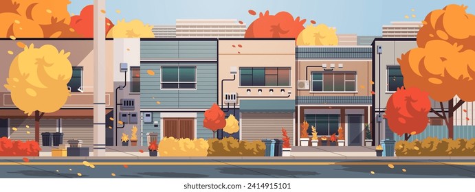 Autumn Japanese residential street. Asian street landscape with yellowed trees and falling leaves