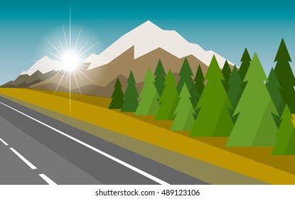The autumn landscape of forests, mountains and roads.
