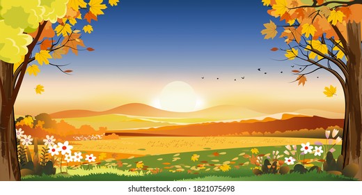 Autumn landscapes of Countryside with sunset and blue and pink sky,Panoramic of mid autumn with farm field, mountains, leaves falling from trees in orange foliage. Wonderland in fall season