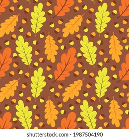 autumn leaf fall. oak leaves and acorns. seamless textile pattern.