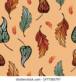 Autumn leafy pattern with colorful leaves on a brown background. Seamless background with leaves in natural earthy tones. Autumn pattern with bright vector leaves. Autumn pattern of hand drawn doodles