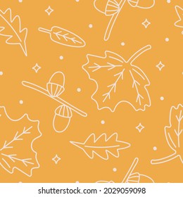 Autumn leaves and acorns seamless vector pattern.