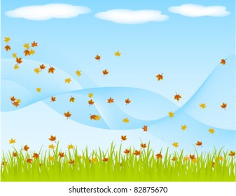 Autumn leaves blowing in the wind.