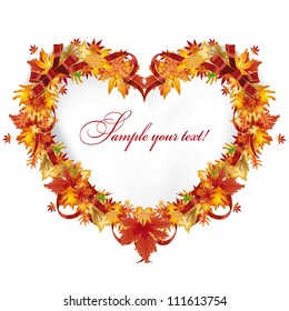 Autumn leaves in the heart frame with a red ribbon