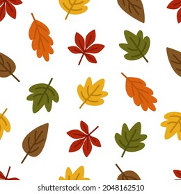 Autumn leaves of oak, maple trees seamless pattern on a white background. Vector illustration in a flat style for a website, printing on paper, fabric, packaging