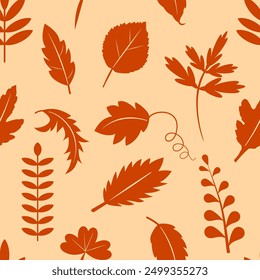 Autumn leaves on yellow seamless pattern