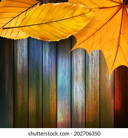 Autumn Leaves over wooden background With copy space. plus EPS10 vector file