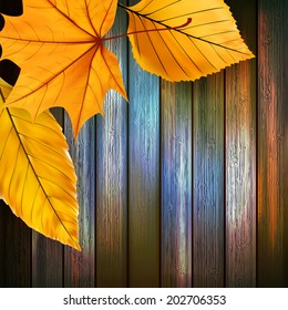 Autumn Leaves over wooden background With copy space. plus EPS10 vector file