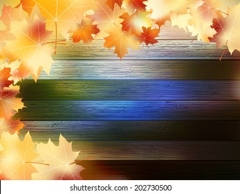 Autumn Leaves over wooden background With copy space. plus EPS10 vector file