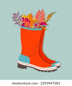 Autumn leaves in pair of a wellies composition. Trendy vector rain boots and leaves. Modern illustration design for web and print. Autumn holiday atmosphere concept. Beautiful pair of red wellies.