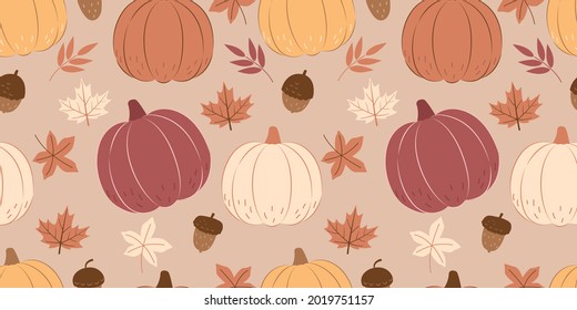 Autumn leaves and pumpkins in seamless pattern, perfect for background, wallpaper, wrapping, fabric and many more