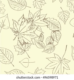 Autumn leaves seamless background in brown