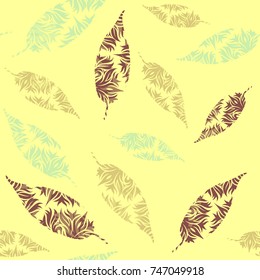 Autumn leaves seamless pattern. Colorful leaf silhouettes with doodle ornate texture on yellow background. Elegant fall design. Vector illustration.