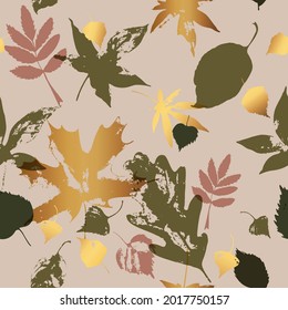 Autumn leaves seamless pattern in golden gradient green colors. Grunge textured leaf silhouettes background. Vector trees foliage illustration for fall design, wallpaper, textile, fabric