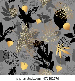 Autumn leaves seamless pattern. Hand drawn leaf silhouettes with doodle, grunge, scribble textures. Natural elements in golden, monochrome colors, background for fall design. Vector illustration