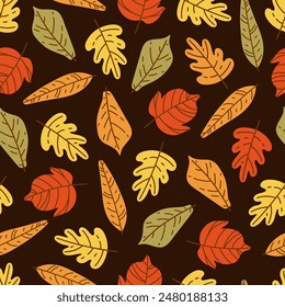 Autumn leaves, seamless vector pattern. Fallen foliage of forest trees - oak, ash, chestnut. Wild colorful plants on a dark background. Hand drawn botanical ornament for autumn mood, Thanksgiving Day