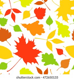 Autumn leaves silhouette vector seamless pattern: oak tree; ash-tree, maple, birch.