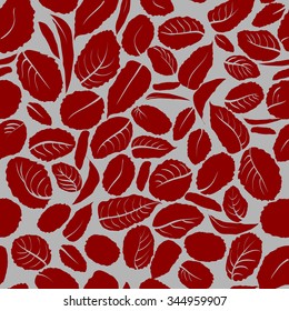 Autumn leaves of trees on a gray background