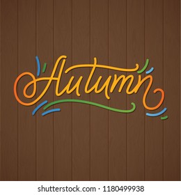 Autumn Lettering. Hand Written Typography on Wood Background. Vector Illustration for Your Design.