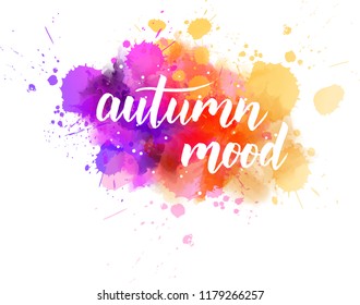 Autumn mood - handwritten modern calligraphy lettering on abstract watercolor splash. Season illustration. Multicolored.