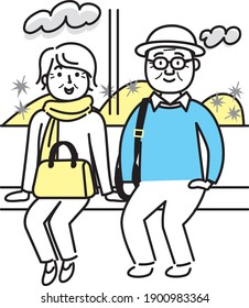 Autumn outing by senior couple train