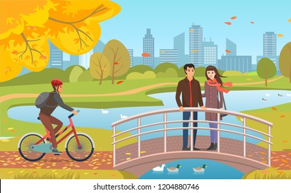 Autumn park with guy in helmet riding bicycle, couple on bridge over pond, windy weather. Flying fall leaves and city skyscrapers vector illustration.