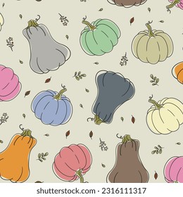 Autumn pattern with colorful pumpkins of different shapes and sprigs of plants