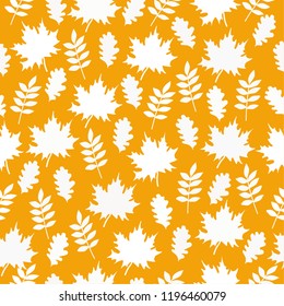 Autumn pattern with leaves of maple, oak, Rowan. Leaves on an orange background. Good for Wallpaper, banner, gift paper, patterns, textiles, postcards. Simple seamless pattern.
