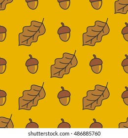 Autumn pattern with nuts and leaves on a yellow background.