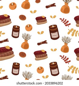 Autumn pattern with vases, sweaters, candles, cakes and leaves
