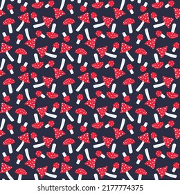 autumn pattern with vibrant fly agaric on dark background 