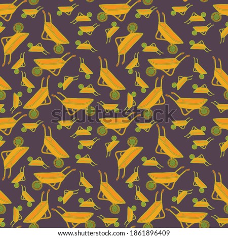 Autumn pattern with a yellow garden wheelbarrow
