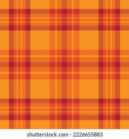 Autumn plaid tartan checkered seamless pattern in orange, and red over amber yellow background. For fabric, textile and textures