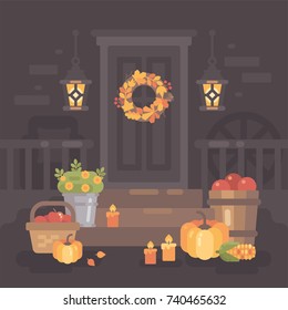 Autumn porch decorated with lanterns, vegetables and leaves. Thanksgiving day home decoration