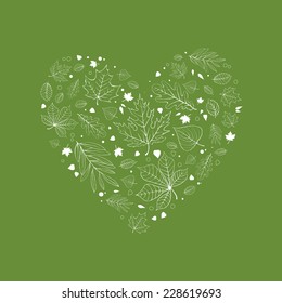 Autumn postcard leaves in heart shaped design on green